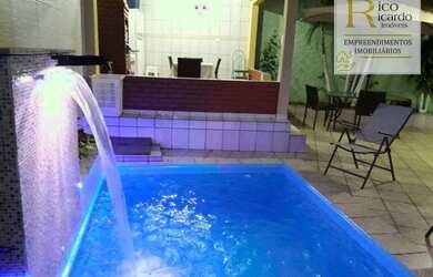 Imagem: A casa possui 3 Dormitórios, 5 Banheiros, 5 Vagas na garagem