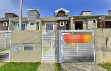 Imagem: A casa possui 3 Dormitórios, 3 Banheiros, 3 Vagas na garagem