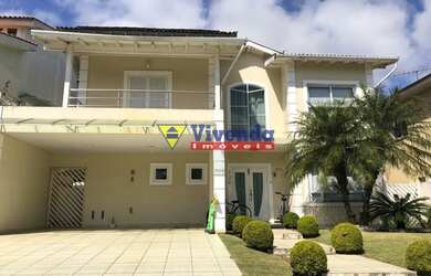 Imagem: A casa em condomínio possui 4 Dormitórios, 5 Banheiros, 2