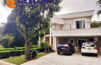 Imagem: A casa em condomínio possui 4 Dormitórios, 5 Banheiros, 5