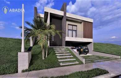 Imagem: A casa possui 3 Dormitórios, 5 Banheiros, 4 Vagas na garagem