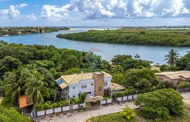 Imagem: A casa possui 5 Dormitórios, 5 Banheiros, 2 Vagas na garagem