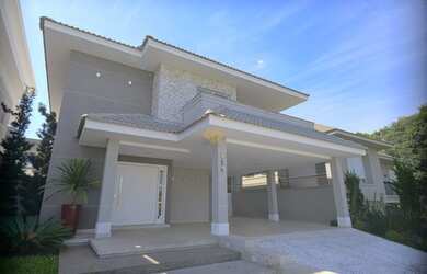 Imagem: A casa possui 2 Dormitórios, 1 Banheiro, 2 Vagas na garagem