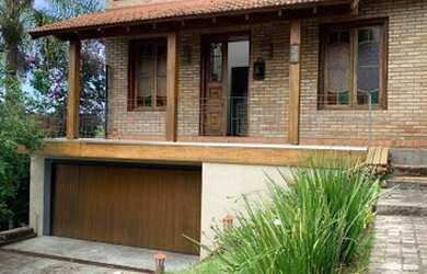 Imagem: A casa em condomínio possui 4 Dormitórios, 2 Banheiros, 4