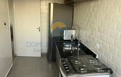 Imagem: O apartamento possui 2 Dormitórios, 1 Banheiro, 1 Vaga na garagem