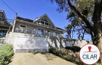 Imagem: A casa possui 4 Dormitórios, 5 Banheiros, 265m² de Área e