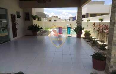 Imagem: A casa possui 5 Dormitórios, 5 Banheiros, 4 Vagas na garagem