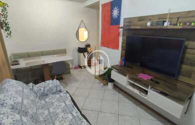 Imagem: O apartamento possui 2 Dormitórios, 1 Banheiro, 1 Vaga na garagem