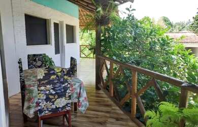 Imagem: A casa possui 5 Dormitórios, 3 Banheiros, 2 Vagas na garagem