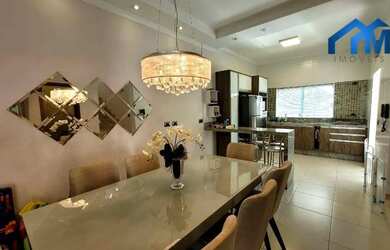 Imagem: A casa possui 3 Dormitórios, 3 Banheiros, 2 Vagas na garagem