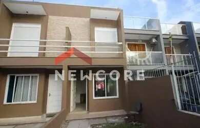 Imagem: A casa possui 2 Dormitórios, 2 Banheiros, 1 Vaga na garagem