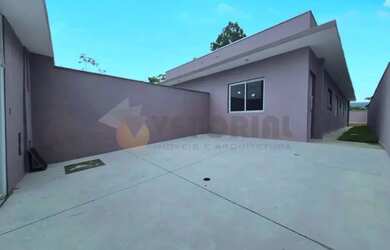 Imagem: A casa possui 3 Dormitórios, 2 Banheiros, 2 Vagas na garagem