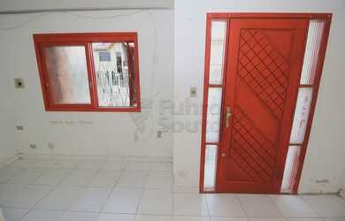 Imagem: A casa possui 2 Dormitórios, 1 Banheiro, 1 Vaga na garagem