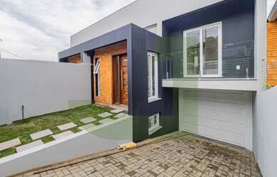 Imagem: A casa possui 3 Dormitórios, 1 Banheiro, 1 Vaga na garagem