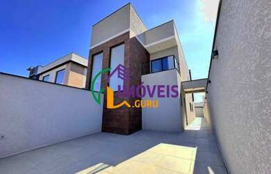 Imagem: A casa possui 3 Dormitórios, 5 Banheiros, 2 Vagas na garagem