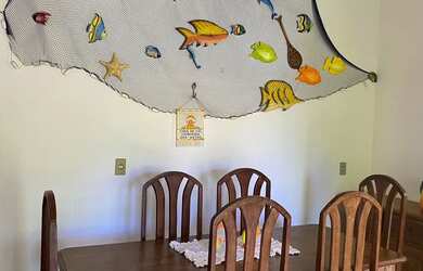 Imagem: A casa possui 3 Dormitórios, Acomodam 9 pessoas, 3 Vagas na