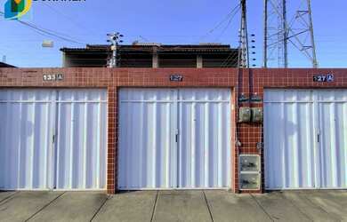 Imagem: A casa possui 2 Dormitórios, 1 Banheiro, 1 Vaga na garagem