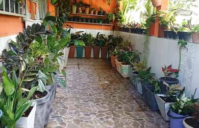 Imagem: A casa possui 5 Dormitórios, 2 Banheiros, 5 Vagas na garagem