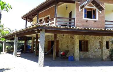 Imagem: A casa possui 5 Dormitórios, 5 Banheiros, 500m² de Área e