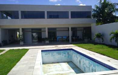 Imagem: A casa possui 5 Dormitórios, 5 Banheiros, 5 Vagas na garagem