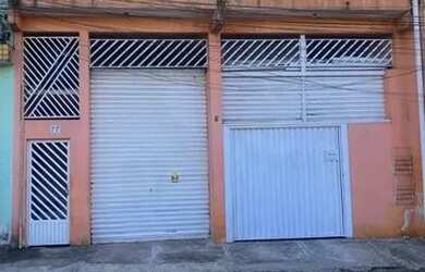 Imagem: A casa possui 2 Dormitórios, 2 Banheiros, 3 Vagas na garagem