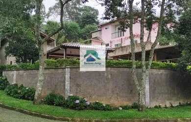 Imagem: A casa em condomínio à venda possui 4 Dormitórios, 2 Banheiros