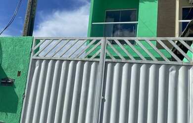 Imagem: A casa possui 2 Dormitórios, 3 Banheiros, 1 Vaga na garagem