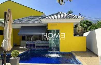 Imagem: A casa em condomínio possui 5 Dormitórios, 5 Banheiros, 5