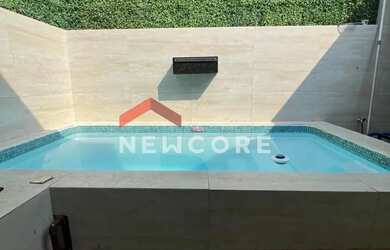 Imagem: A casa possui 3 Dormitórios, 2 Banheiros, 2 Vagas na garagem