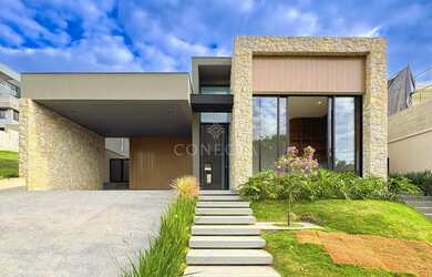 Imagem: A casa possui 3 Dormitórios, 4 Banheiros, 4 Vagas na garagem