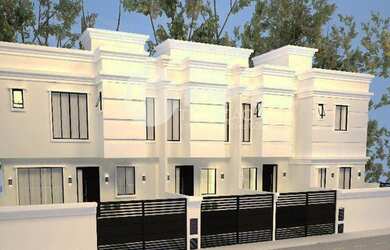 Imagem: A casa possui 3 Dormitórios, 3 Banheiros, 2 Vagas na garagem