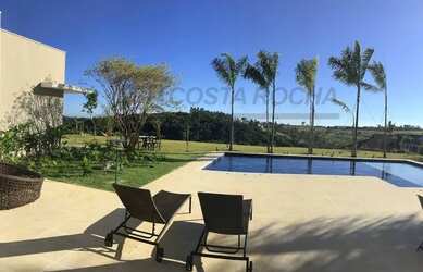 Imagem: A casa em condomínio possui 5 Dormitórios, 5 Banheiros, 5