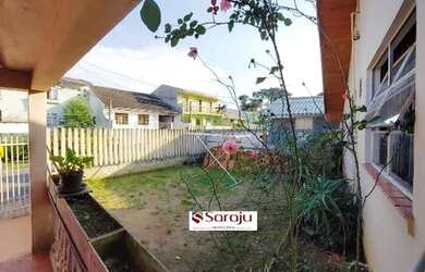 Imagem: A casa possui 2 Dormitórios, 1 Banheiro, 2 Vagas na garagem