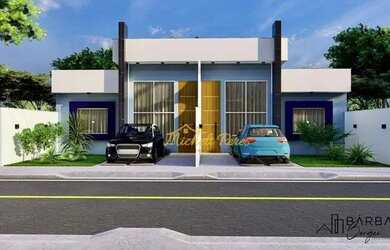 Imagem: A casa possui 3 Dormitórios, 2 Banheiros, 2 Vagas na garagem