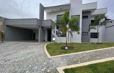 Imagem: A casa em condomínio possui 4 Dormitórios, 5 Banheiros, 4