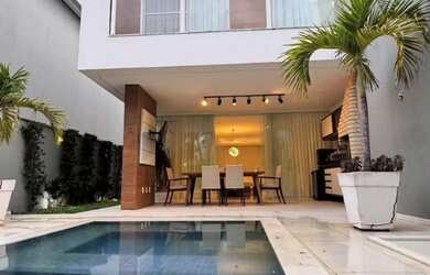 Imagem: A casa em condomínio possui 4 Dormitórios, 4 Banheiros, 3