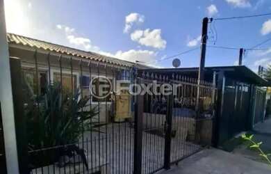 Imagem: A casa possui 2 Dormitórios, 1 Banheiro, 1 Vaga na garagem