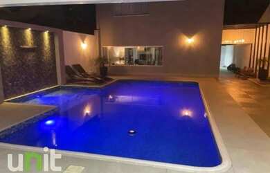 Imagem: A casa possui 3 Dormitórios, 3 Banheiros, 4 Vagas na garagem