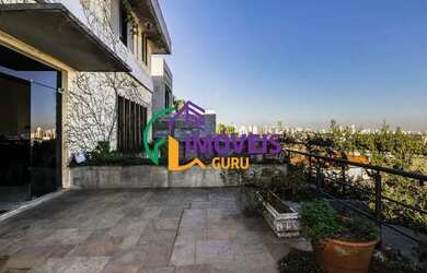 Imagem: A casa possui 4 Dormitórios, 5 Banheiros, 5 Vagas na garagem