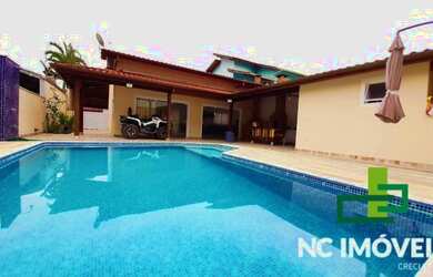 Imagem: A casa em condomínio possui 4 Dormitórios, 3 Banheiros, 200m²