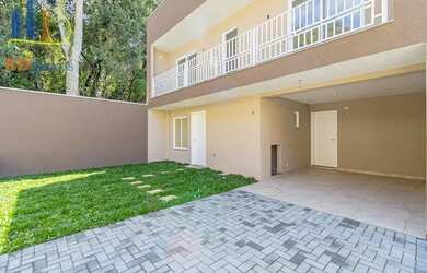 Imagem: A casa possui 3 Dormitórios, 3 Banheiros, 2 Vagas na garagem