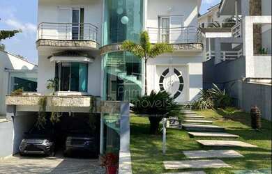 Imagem: A casa em condomínio possui 4 Dormitórios, 5 Banheiros, 4