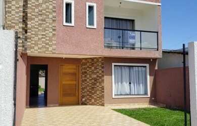 Imagem: A casa possui 3 Dormitórios, 3 Vagas na garagem e está localizado