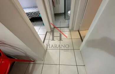 Imagem: O apartamento possui 2 Dormitórios, 1 Banheiro, 1 Vaga na garagem