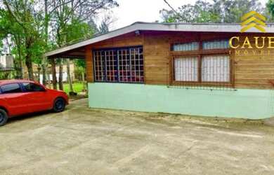 Imagem: A casa em condomínio possui 3 Dormitórios, 1 Banheiro, 2 Vagas