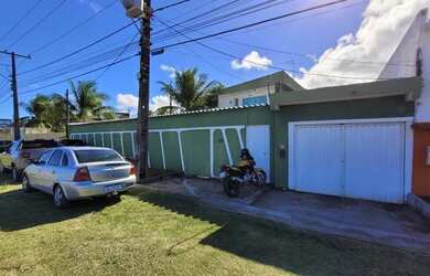 Imagem: A casa possui 3 Dormitórios, 3 Banheiros, 4 Vagas na garagem