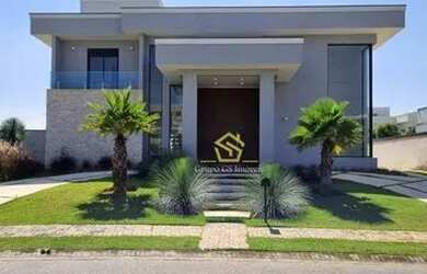 Imagem: A casa possui 4 Dormitórios, 5 Banheiros, 5 Vagas na garagem