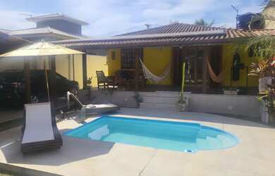 Imagem: A casa em condomínio possui 4 Dormitórios, 3 Banheiros, 5