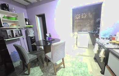 Imagem: A casa possui 2 Dormitórios e 2 Banheiros e está localizado