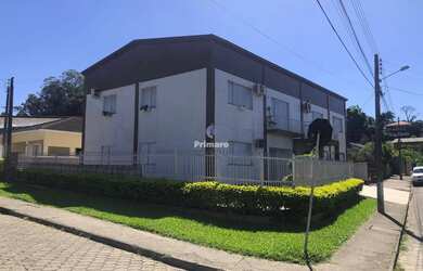 Imagem: A casa possui 3 Dormitórios, 1 Banheiro, 2 Vagas na garagem